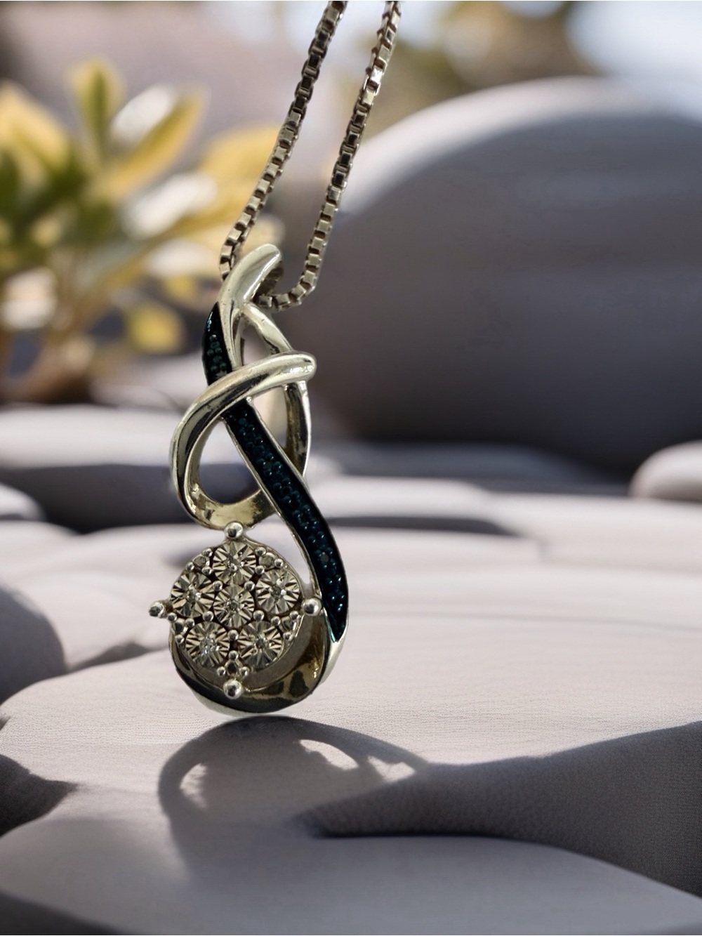 Sterling Silver Swirl Pendant Necklace with Blue and White diamonds